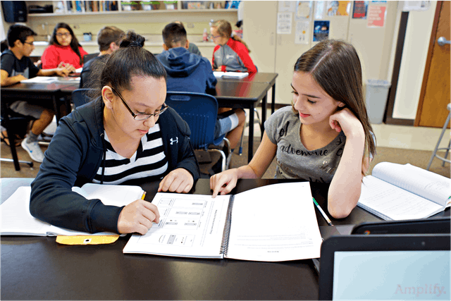 Students learning with Amplify Science